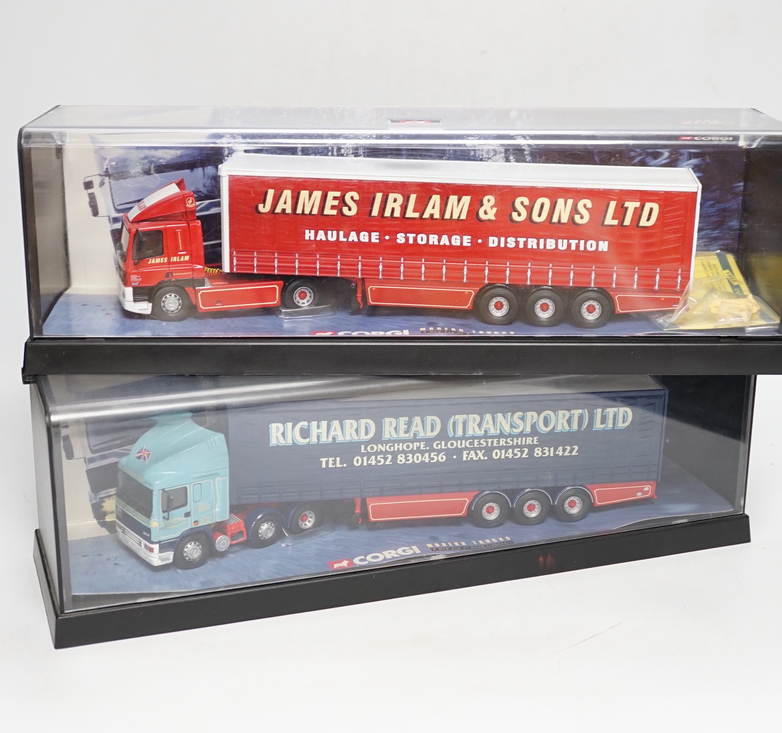 Four boxed Corgi and Universal Hobbies 1:50 scale articulated trucks; a Leyland DAF lorry (75401), an ERF curtainside lorry (75203), a Lion Toys DAF with box trailer, and a Universal Hobbies Scania Topline